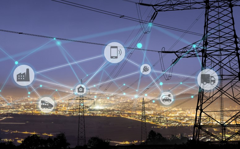 Eine Elektrizitätsversorgungslandschaft bei Nacht mit IoT-Blasen.